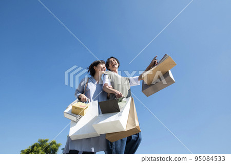 Couple lover couple shopping shopping blue sky image 95084533