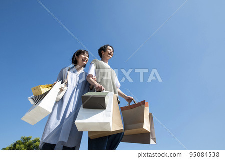 Couple lover couple shopping shopping blue sky image Couple lover couple shopping shopping blue sky image 95084538