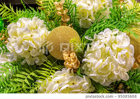Holiday floral decoration of the Christmas tree. 95085608