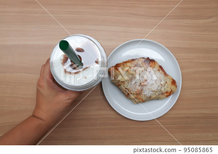 cocoa or iced chocolate, iced cocoa and almond croissant cocoa or iced chocolate, iced cocoa and almond croissant 95085865