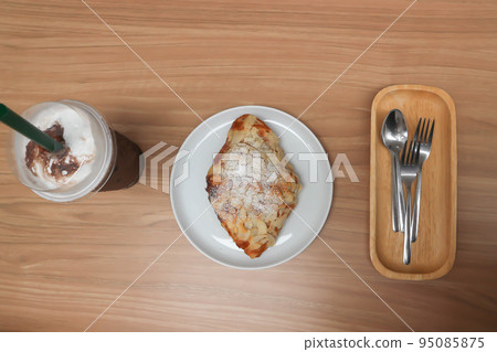 almond croissant or croissant , French croissant and iced cocoa almond croissant or croissant , French croissant and iced cocoa 95085875