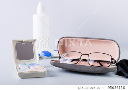 Box for storing contact lens care items and glasses in a case. Choosing a vision correction method Box for storing contact lens care items and glasses in a case. Choosing a vision correction method 95086138