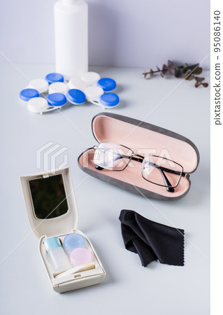 Box for storing contact lens care items and glasses in a case. Choosing correction method. Vertical Box for storing contact lens care items and glasses in a case. Choosing correction method. Vertical 95086140