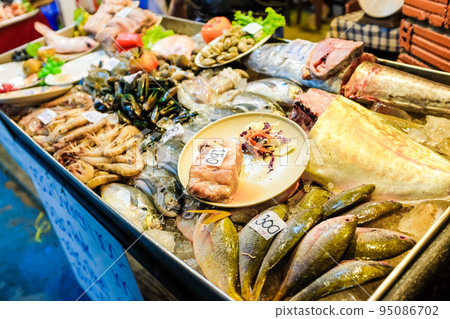Seafood on ice sell in local fishery night market Seafood on ice sell in local fishery night market 95086702