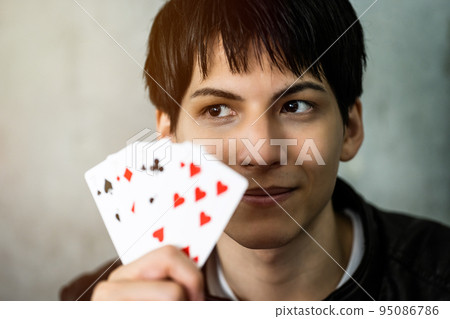 playing cards and man 95086786
