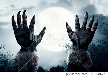 Werewolf hand with a full moon 95088674