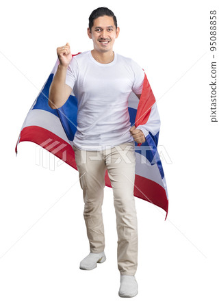 Asian men celebrate Thailand's independence day on 05 December by holding the Thailand flag 95088858