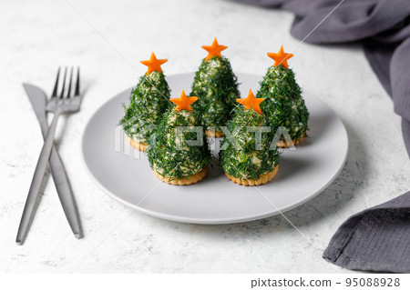 Holiday appetizer in form of christmas tree Holiday appetizer in form of christmas tree 95088928