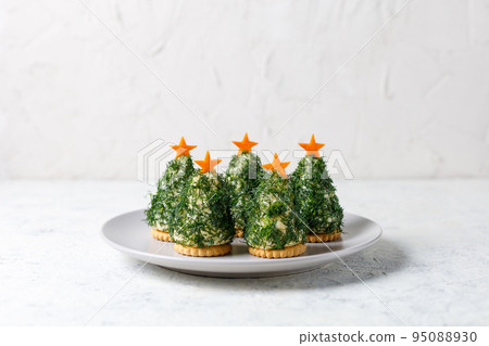 Holiday appetizer in form of christmas tree Holiday appetizer in form of christmas tree 95088930