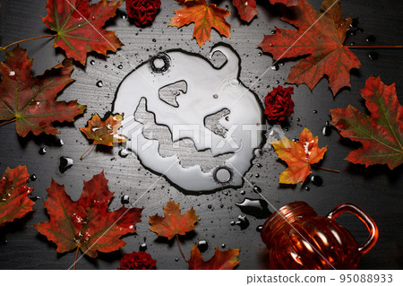 Halloween greeting card with pumpkin and leaves Halloween greeting card with pumpkin and leaves 95088933