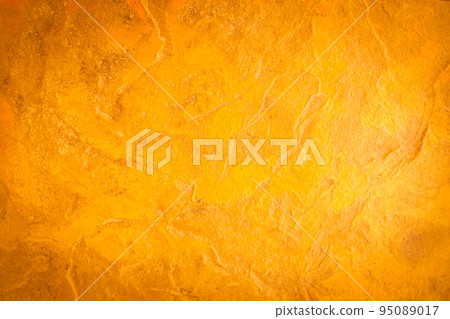 Gold stone texture background. Gold or foil wall texture backdrop design. Walls are decorated with gold-colored filters. Cement orange wall background. gold color wall for the background. 95089017