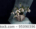 First spring flower snowdrop. Still life photography, template for postcards, greeting cards, Mother's Day, Valentine's Day, still life magazines, garden, etc. 95090396