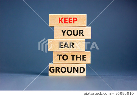 Keep your ear to the ground symbol. Concept words Keep your ear on the ground on wooden blocks. Beautiful grey table grey background. Business keep your ear on the ground concept. Copy space. Keep your ear to the ground symbol. Concept words Keep your ear on the ground on wooden blocks. Beautiful grey table grey background. Business keep your ear on the ground concept. Copy space. 95093010