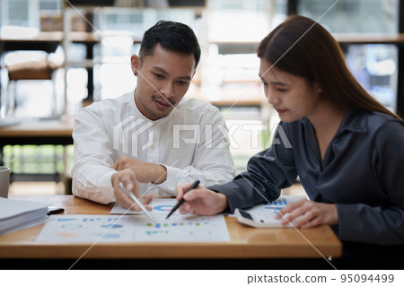 Business team hands at working with financial plan, meeting, discussion, brainstrom with tablet on office desk, Meeting concept 95094499