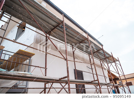 Construction company build a new house building Construction company build a new house building 95095149