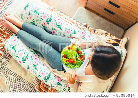 Pregnant healthy eating salad. Pregnancy woman eating nutrition healthy food. Healthy breakfast concept. Pregnant healthy eating salad. Pregnancy woman eating nutrition healthy food. Healthy breakfast concept. 95096014