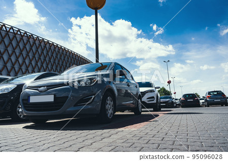 Rent parking space. Car lot parking space in underground city garage. Empty road asphalt background. Parking space search, No parking space. 95096028