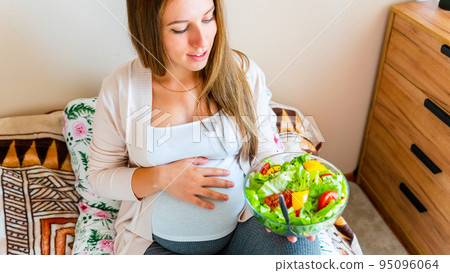 Pregnant healthy food diet. Pregnancy woman eating nutrition diet food salad. Healthy vegetarian food, healthy lifestyle. Pregnant healthy food diet. Pregnancy woman eating nutrition diet food salad. Healthy vegetarian food, healthy lifestyle. 95096064