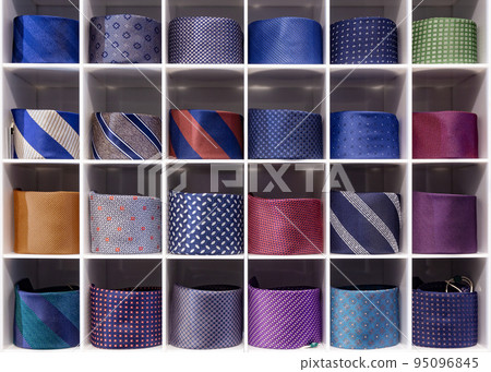View of different colors ties in showcase. 95096845
