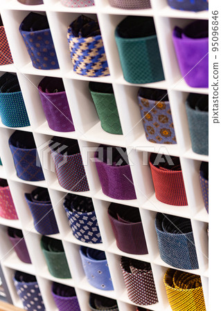View of different colors ties in showcase. View of different colors ties in showcase. 95096846