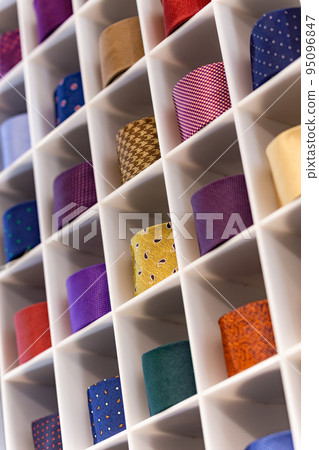 View of different colors ties in showcase. View of different colors ties in showcase. 95096847