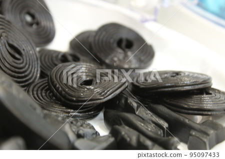 Black licorice sweets. Sweets for Halloween. Scary and delicious Black licorice sweets. Sweets for Halloween. Scary and delicious 95097433