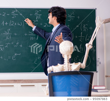 Young male math teacher and student skeleton Young male math teacher and student skeleton 95097863