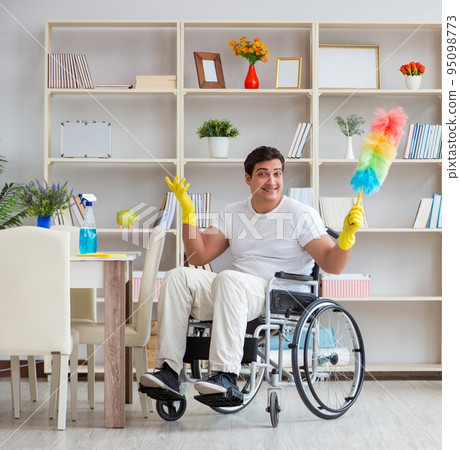Disabled cleaner doing chores at home Disabled cleaner doing chores at home 95098773