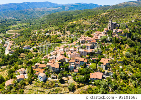 Panoramic view from above on the city Eus. Small town located on high mountain. Eastern Pyrenees Panoramic view from above on the city Eus. Small town located on high mountain. Eastern Pyrenees 95101665