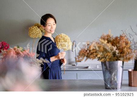 Careful living surrounded by flowers 95102925