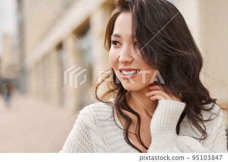 Lifestyle portrait beautiful Asian kazakh woman with brilliant smile Lifestyle portrait beautiful Asian kazakh woman with brilliant smile 95103847