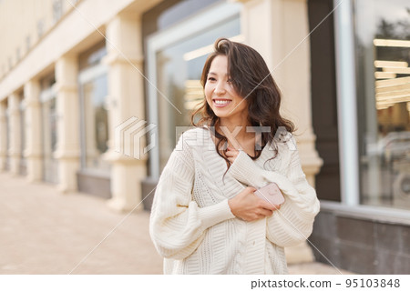 Lifestyle portrait beautiful Asian kazakh woman with brilliant smile Lifestyle portrait beautiful Asian kazakh woman with brilliant smile 95103848