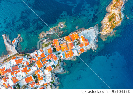View of Chora town on the beautiful Andros island in Cyclades, Greece, Europe 95104338