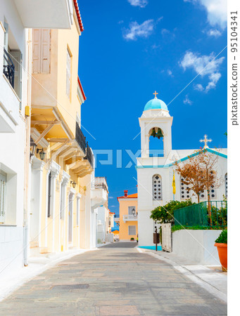 View of Chora town on the beautiful Andros island in Cyclades, Greece, Europe 95104341