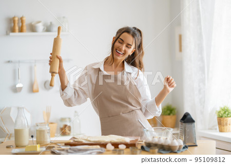 woman is preparing bakery woman is preparing bakery 95109812