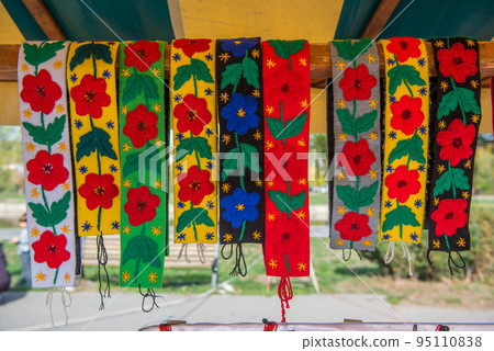 Traditional Romanian clothe accessories, colorful pattern 95110838