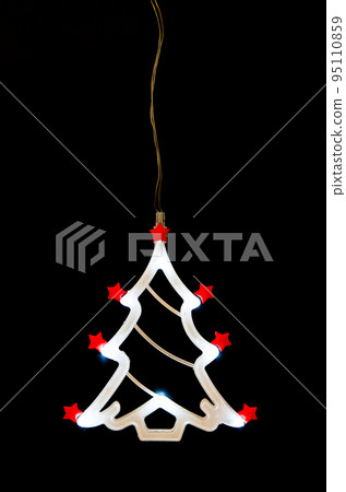 Christmas tree shaped led light on black Christmas tree shaped led light on black 95110859