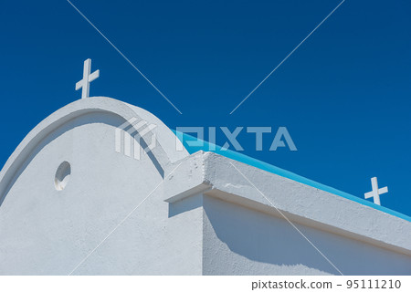 Traditional white chapel with a blue roof on the seaside. Agioi Anargyroi, Cyprus Traditional white chapel with a blue roof on the seaside. Agioi Anargyroi, Cyprus 95111210