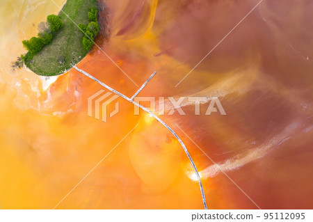 Aerial view of acid colorful mine waste waters Aerial view of acid colorful mine waste waters 95112095