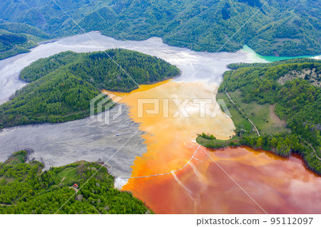 Aerial view of a big waste decanting lake Aerial view of a big waste decanting lake 95112097