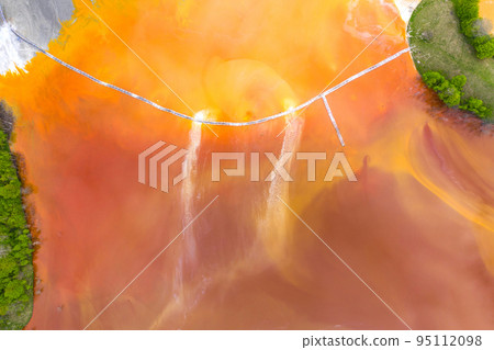 Aerial view of acid colorful mine waste waters Aerial view of acid colorful mine waste waters 95112098