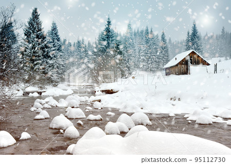 Winter landscape with snowy trees and a mountain hut Winter landscape with snowy trees and a mountain hut 95112730