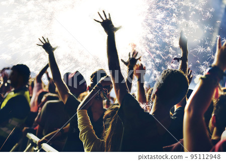 New Year fireworks and partying people 95112948