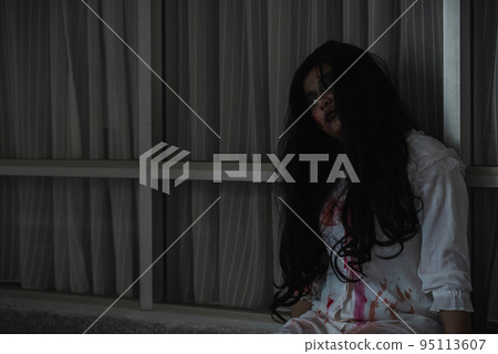 woman ghost creepy in a dark room at house woman ghost creepy in a dark room at house 95113607