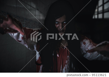 Asian woman ghost horror creepy scary have hair covering face with blood walk following camera Asian woman ghost horror creepy scary have hair covering face with blood walk following camera 95113621