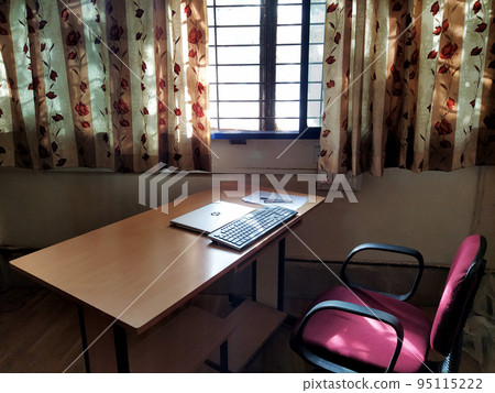 Workspace by window during lockdown or covid times, Dharwad, Karnataka, India Workspace by window during lockdown or covid times, Dharwad, Karnataka, India 95115222