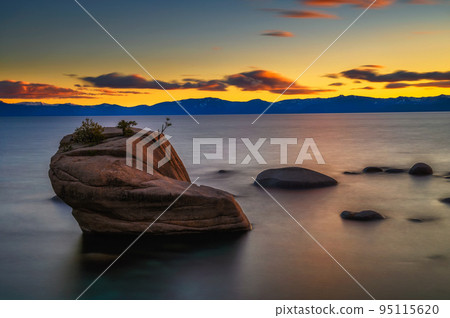 Dramatic sunset over the Bonsai Rock of Lake Tahoe, Nevada Dramatic sunset over the Bonsai Rock of Lake Tahoe, Nevada 95115620