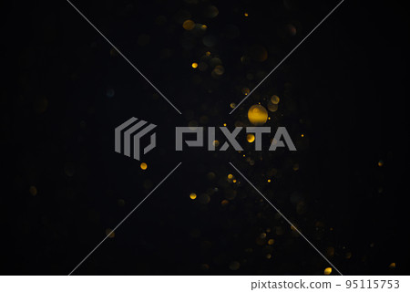 Few golden glitter bokeh sparkles lights dark abstract overlay background Few golden glitter bokeh sparkles lights dark abstract overlay background 95115753