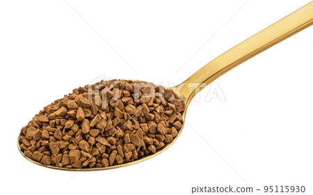 Instant coffee in gold spoon isolated on white background 95115930