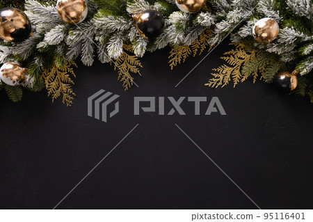 Christmas frame with golden balls, snowy fir branches. Christmas frame with golden balls, snowy fir branches. 95116401